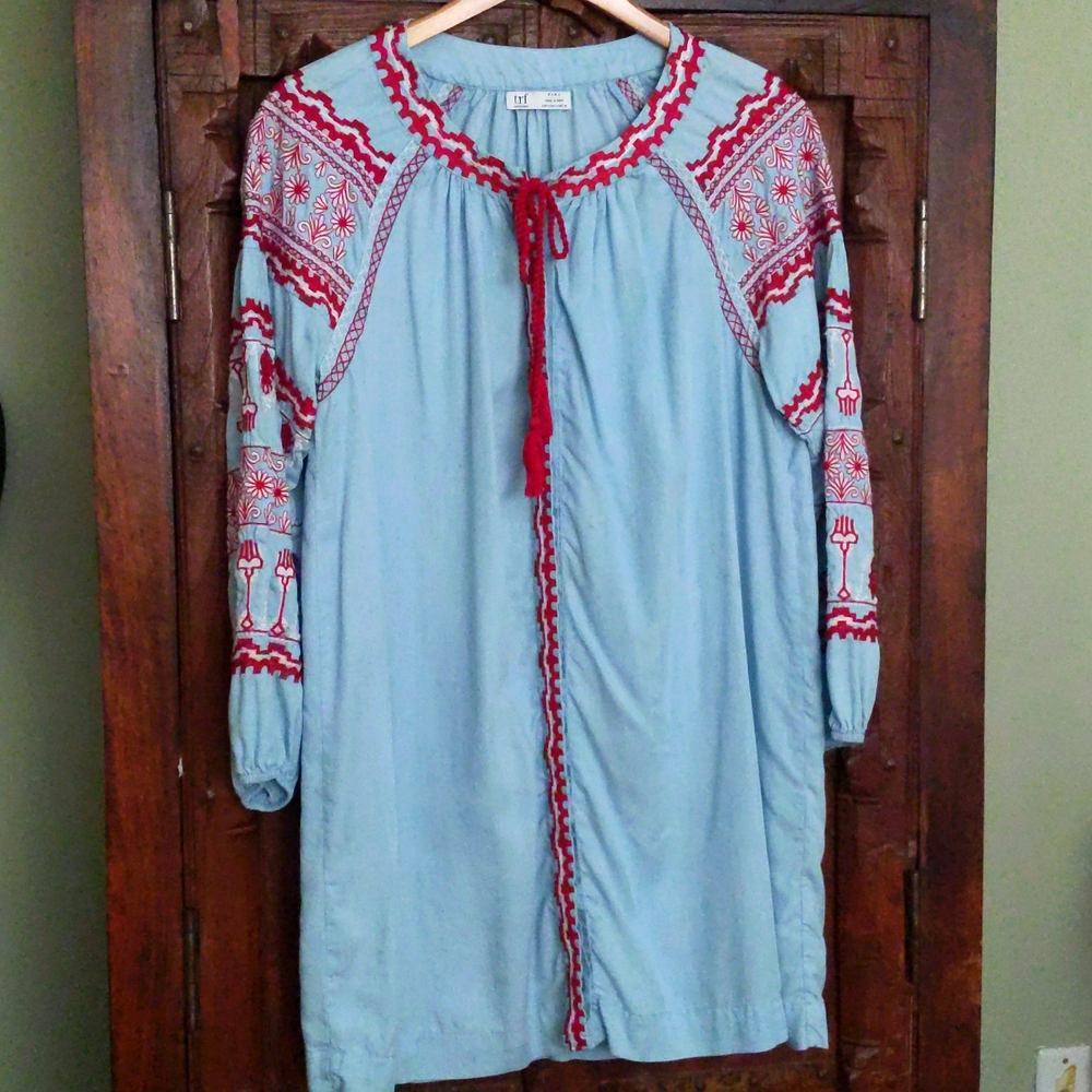 Women's mini dress, embroidered size small in light blue color.